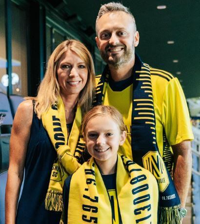 Nate Bargatze with his wife Laura Baines and daughter Harper.